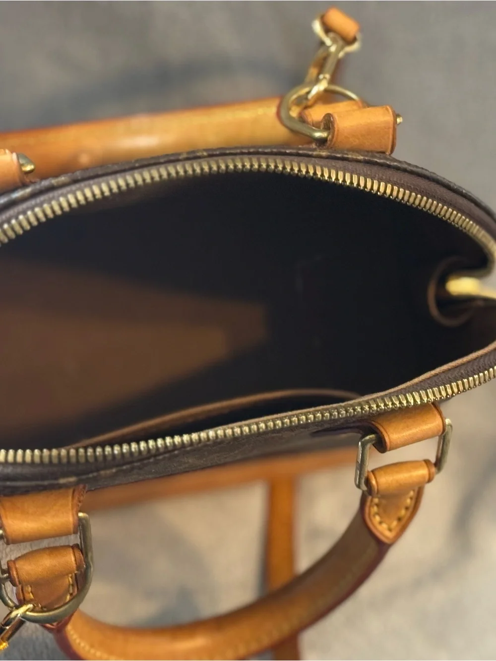 Louis Vuitton Brown Monogram Alma Satchel with Tan Trim
